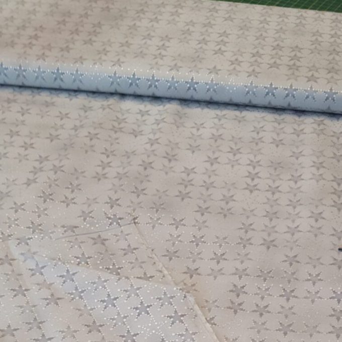 tela gris de estrellas