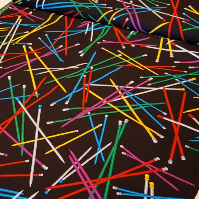 tela negra con estampado de agujas de punto