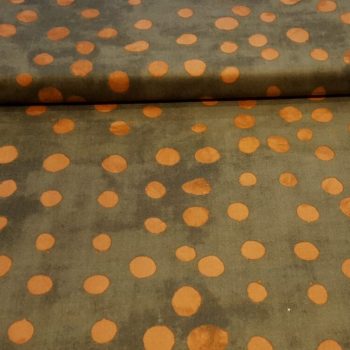 tela ocre lamparones naranjas