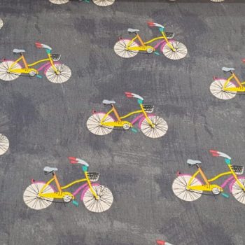 **Tela patchwork gris bicis** de algodón 100% con un ancho de 1,10m para proyectos de costura creativa y quilting