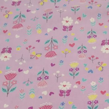 Tela rosa flores** de algodón 100% con estampado de flores sobre fondo rosa de 1,10m de ancho