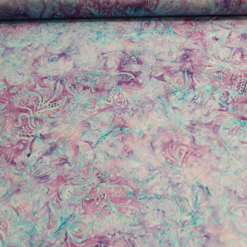 Tejido de algodón Batik artesanal con degradado de manchas en azul turquesa y motas violetas para costura creativa