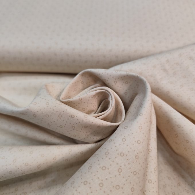 tela beige círculos y puntos