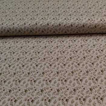 Tejido de algodón premium Robert Kaufman en color beige arena con estampado de flores pequeñas en tonos suaves para costura y acolchado